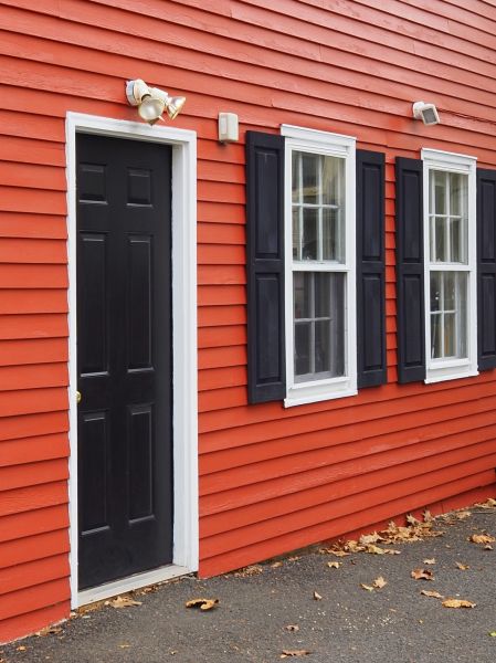 Red Vinyl Siding Installation in Plano